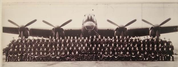 A group of people sitting in front of a plane

AI-generated content may be incorrect.