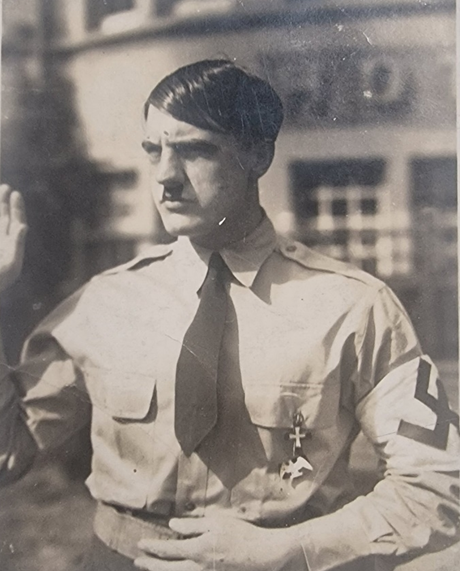 In fancy dress as Adolf Hitler