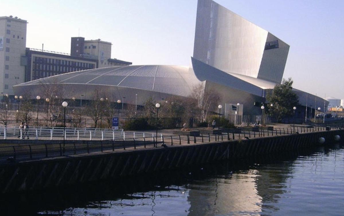 Modern striking  building next to canal